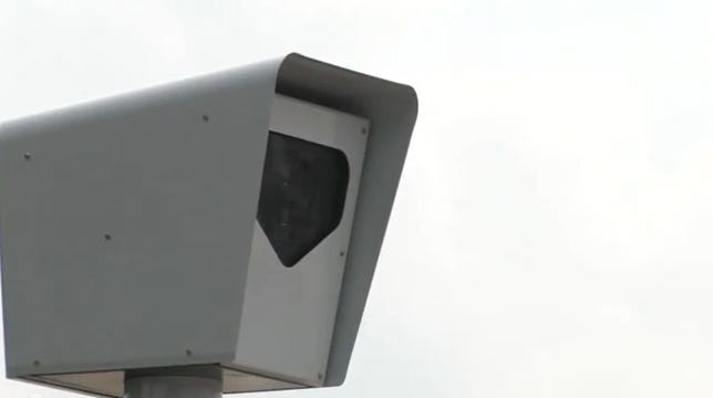 A RedFlex red light camera.