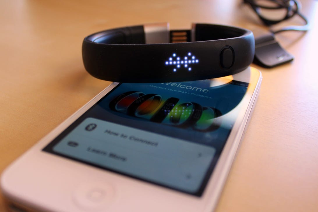 The Nike FuelBand paired with an iPhone.