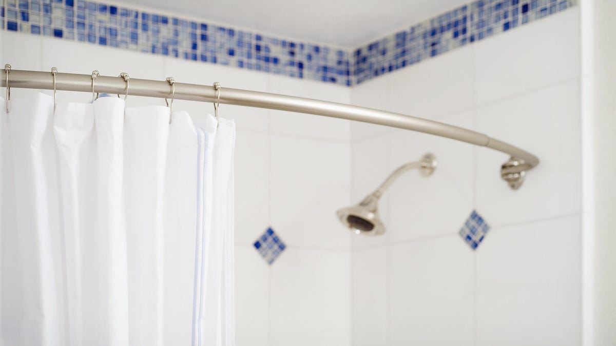 Here S How To Stop Your Shower Curtain, How To Attach Shower Curtain Rod Tile
