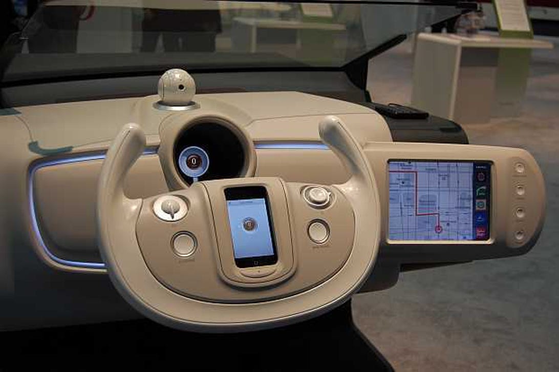 Denso's dashboard concept features a robotic eye that keeps an eye on the driver's behavior.