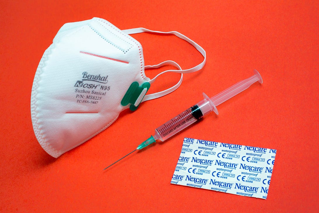 covid-19-masks-booster-shots-vaccines-syringes-bandaids-winter-2021-cnet-057