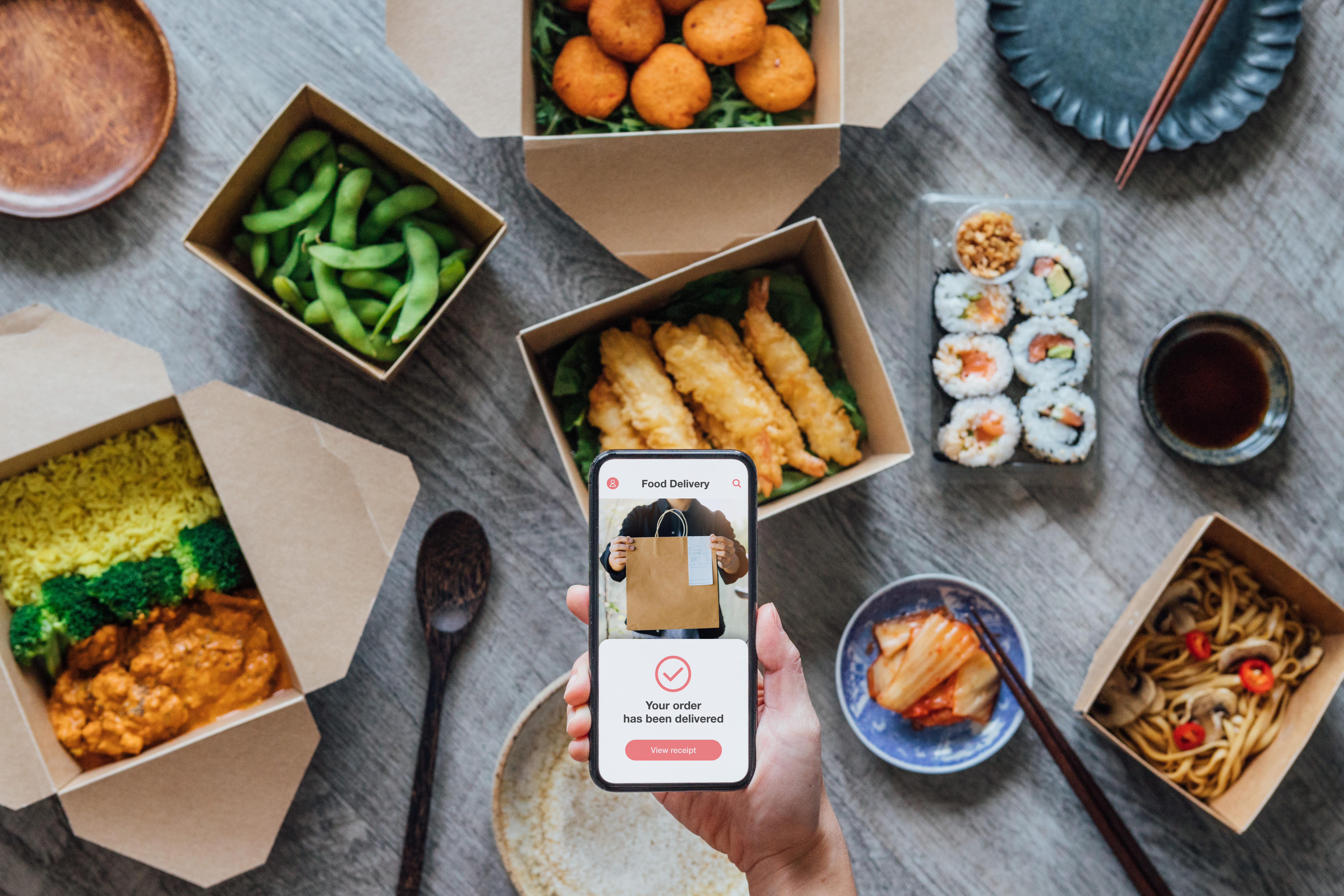Food delivery apps say they’re saving restaurants. Instead they’re charging big fees