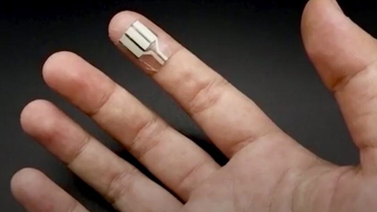 The small device shown on someone's index finger 
