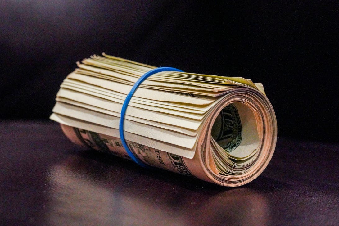 030-money-us-dollar-bills-roll-stack-cash