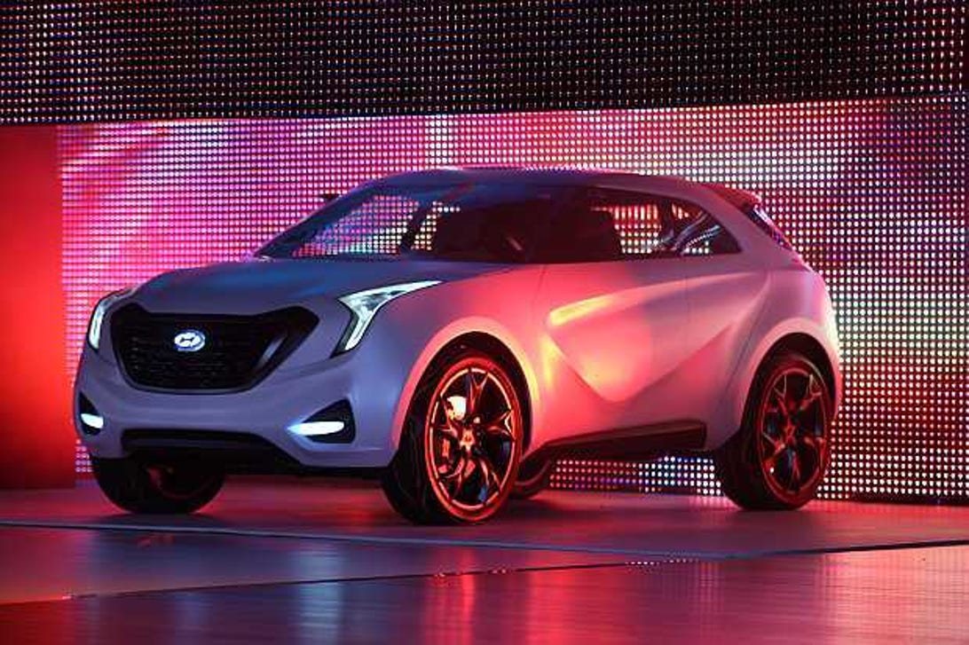Hyundai's HCD-12 Curb Concept blends what the automaker calls "tough tech" with "fluidic sculpture" design language.