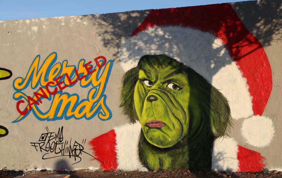 Graffiti proclaiming the cancellation of Christmas, featuring the Dr. Seuss Grinch character