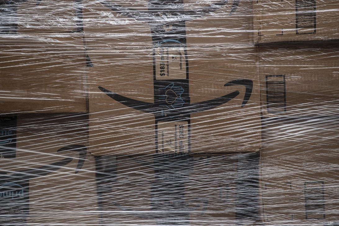 Amazon boxes bundled with industrial plastic wrap.