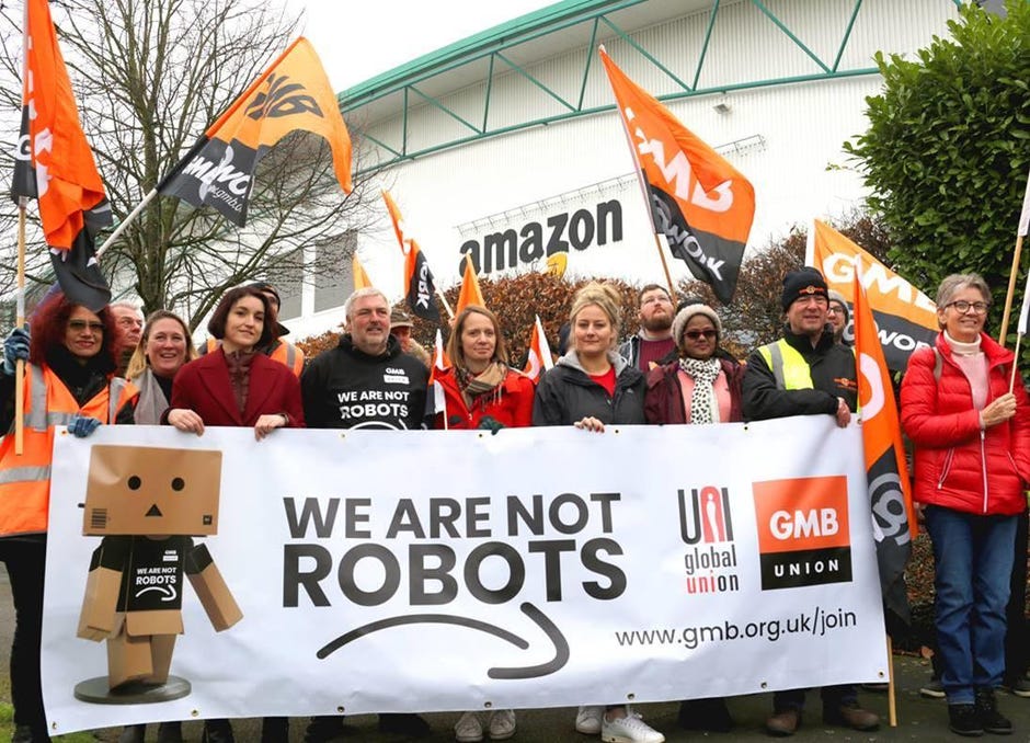 Amazon workers in Europe mark Black Friday with 'we are not robots' protests - CNET