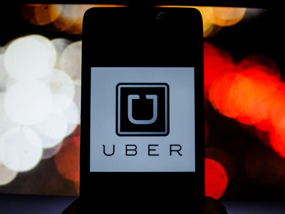Uber logo on a smartphone.