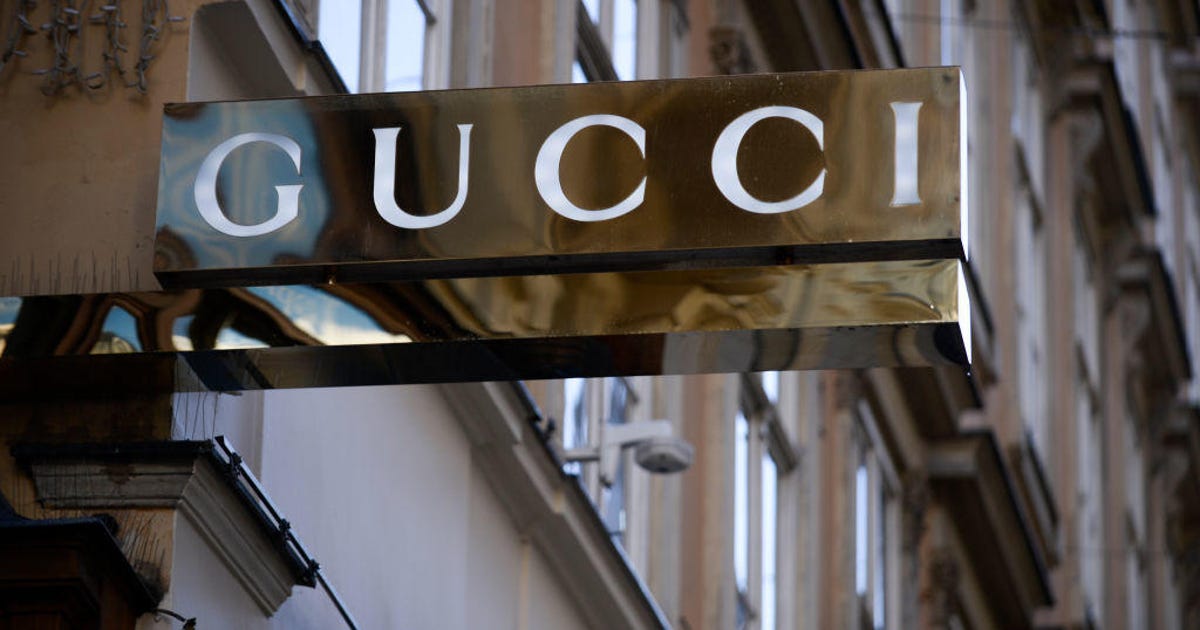 Apple partners with Gucci, Saint Laurent for in-store apps - CNET