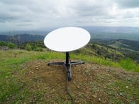 <p>Starlink antenna dish sitting on top of Mount Diablo</p>
