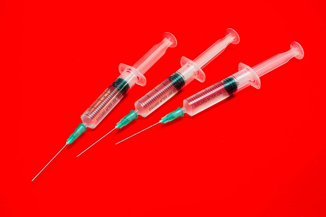 covid-19-vaccines-3rd-booster-shot-syringes-winter-2021-cnet-030