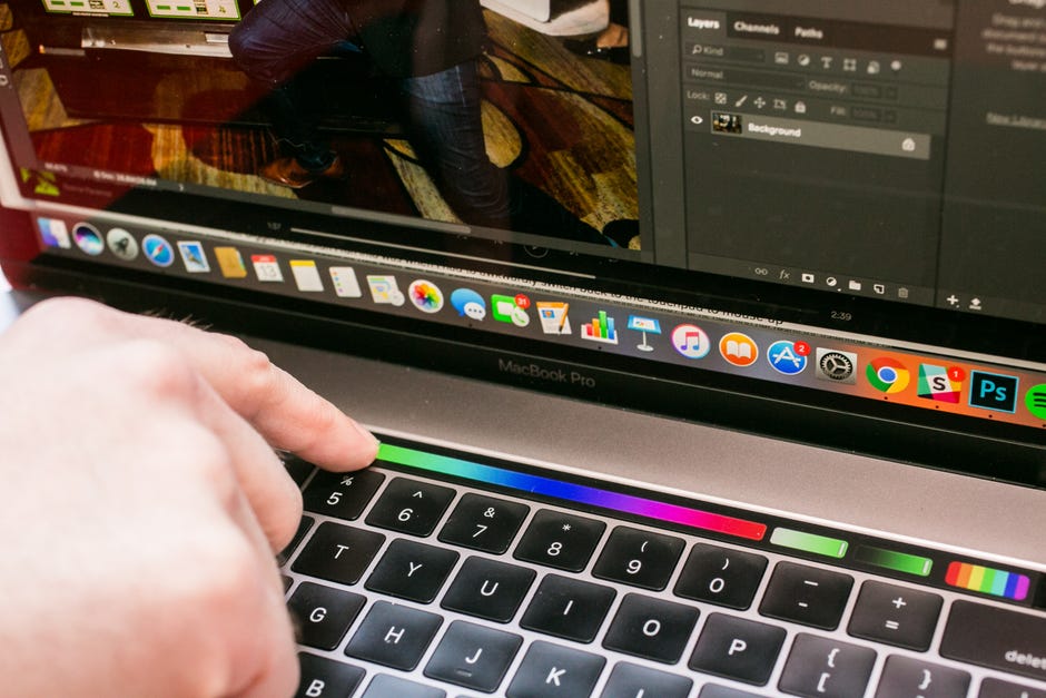 Apple macbook pro 15 laptop with touchbar and touch id The Macbook Pro With Touch Bar Has A Trackpad That S Bigger Than Your Entire Phone Cnet