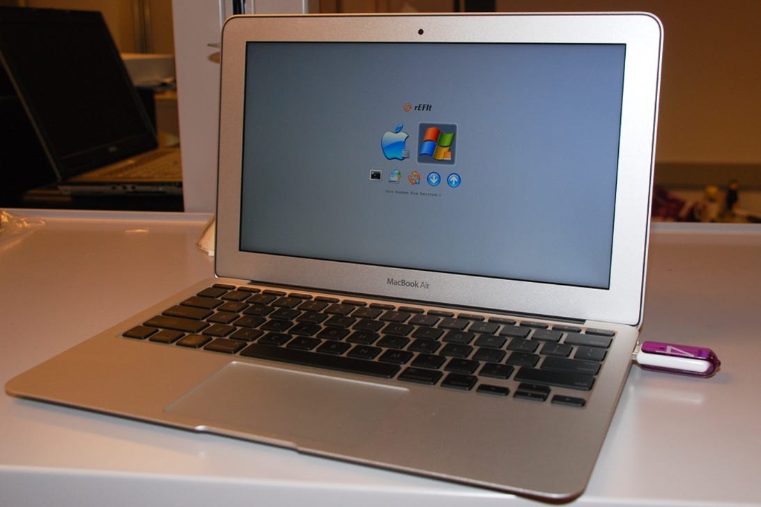 rEFIt allows for booting the MacBook Air from other a USB thumb drive, which is represented by the Microsoft logo with the icon of an external hard drive at one corner.