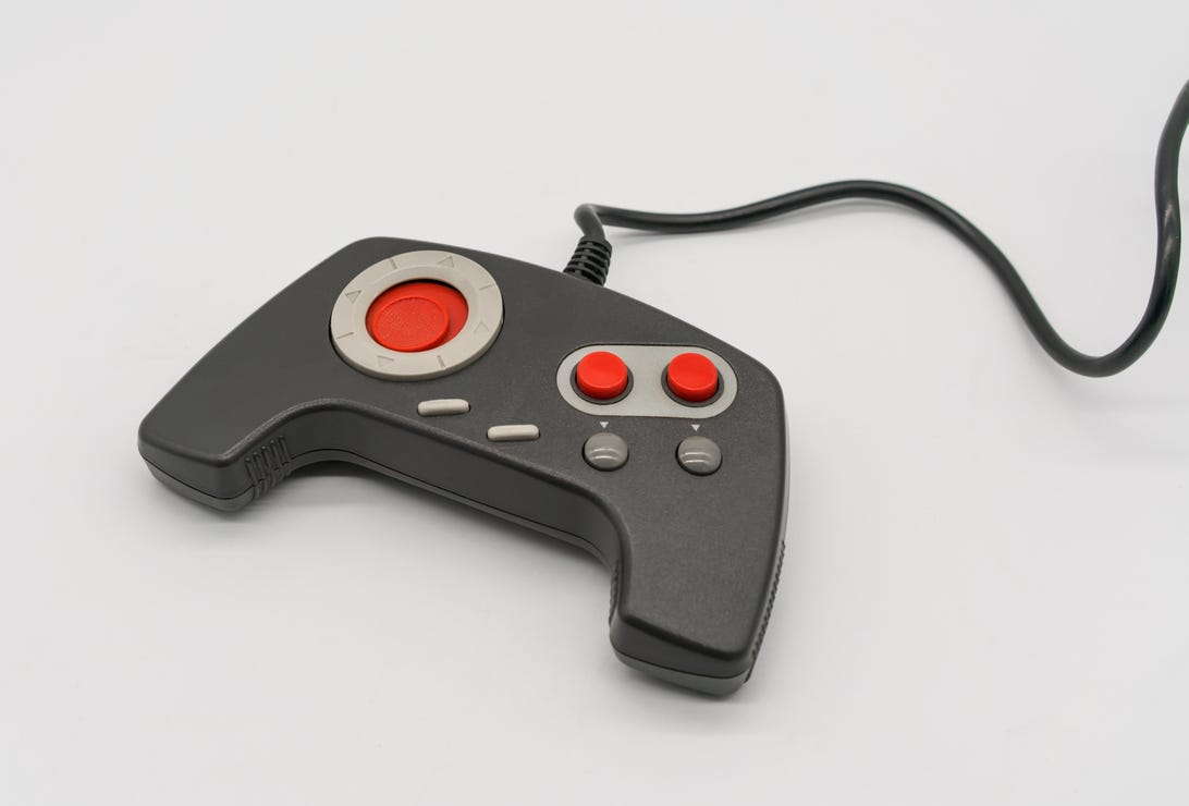 Close-Up Of Gamepad Over White Background