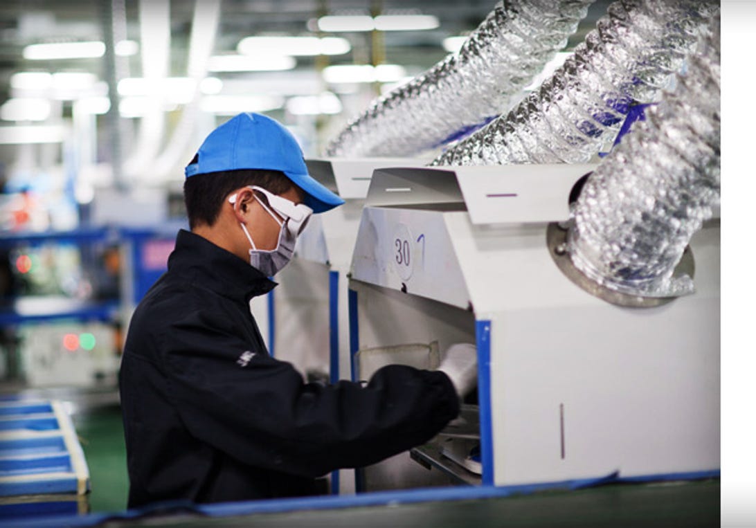 A worker at one of Apple's supplier plants