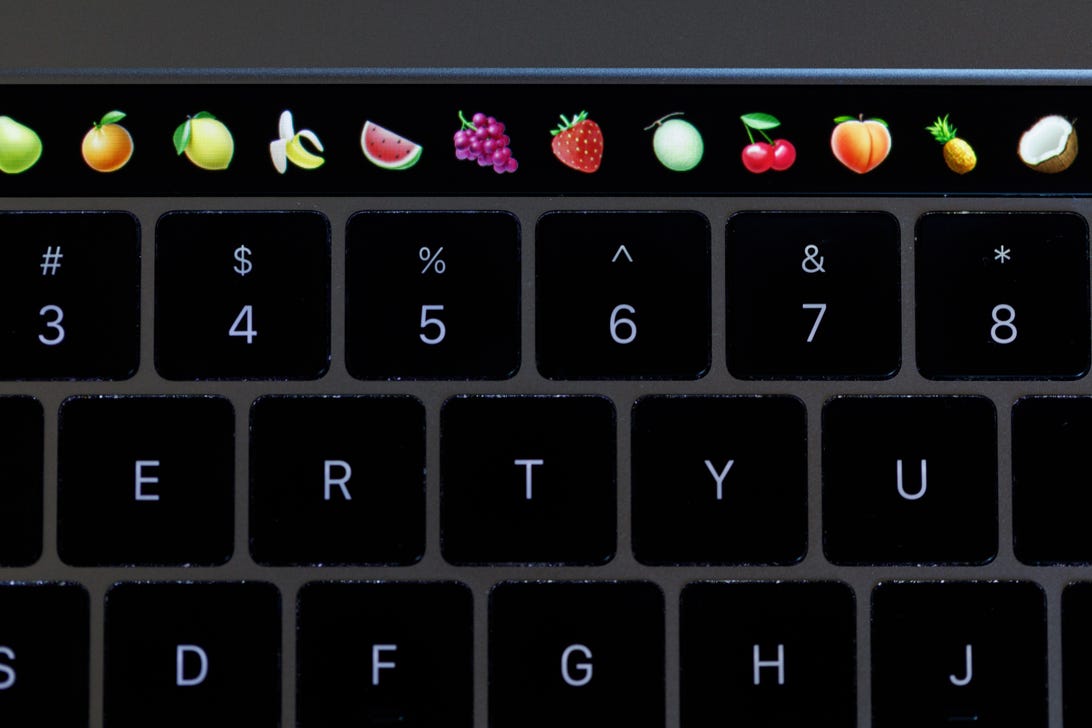 The MacBook Pro Touch Bar can be used to find emoji.