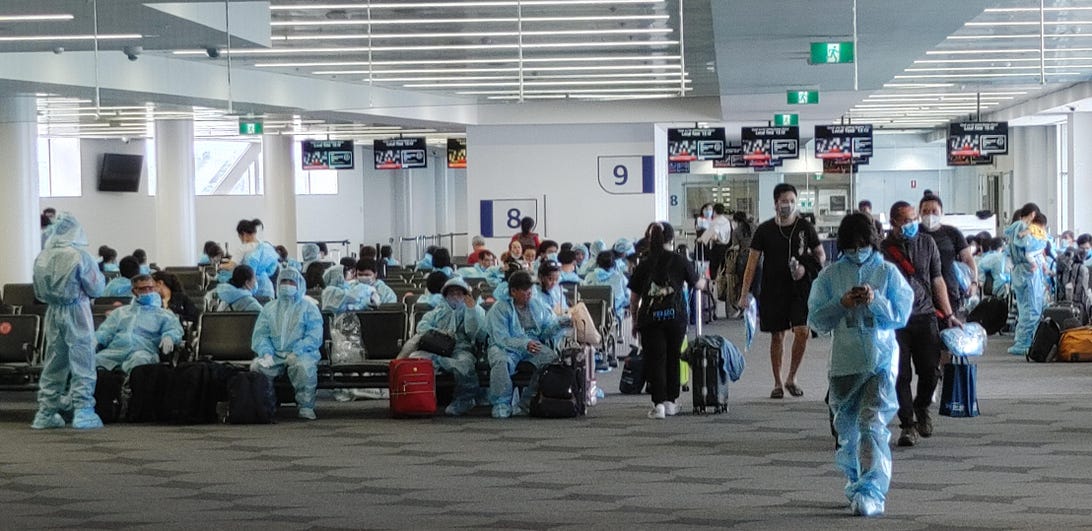 Passengers wait at Sydney airport