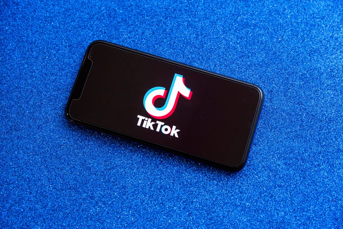 TikTok logo on a phone screen