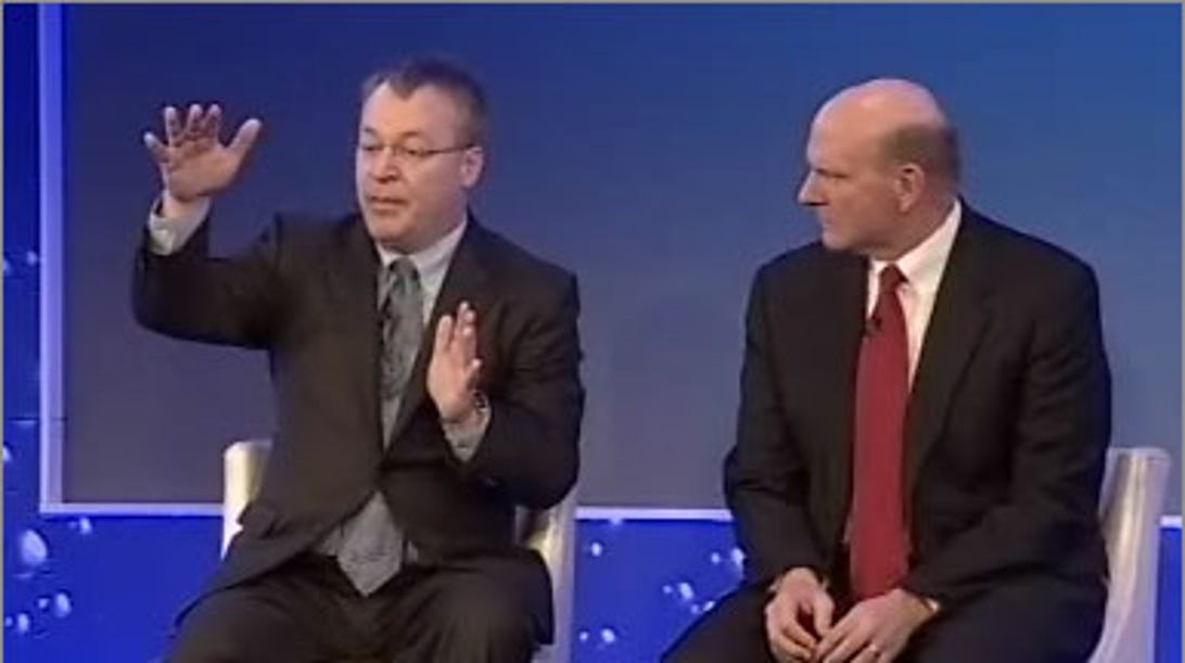 Then-Nokia CEO Stephen Elop, left, and Microsoft CEO Steve Ballmer discussing their Windows Phone alliance in 2011.