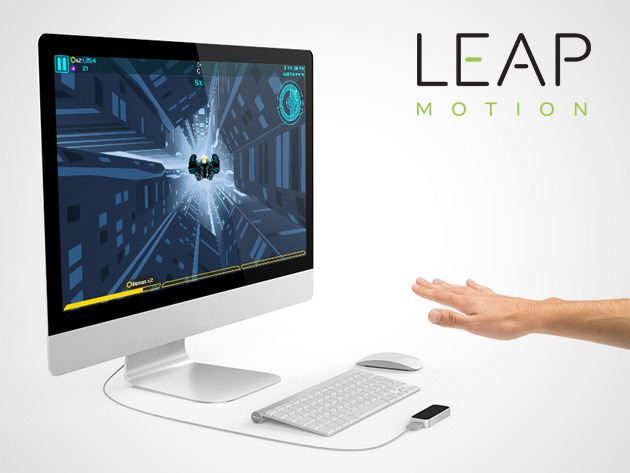 leap-motion-controller-with-hand.png