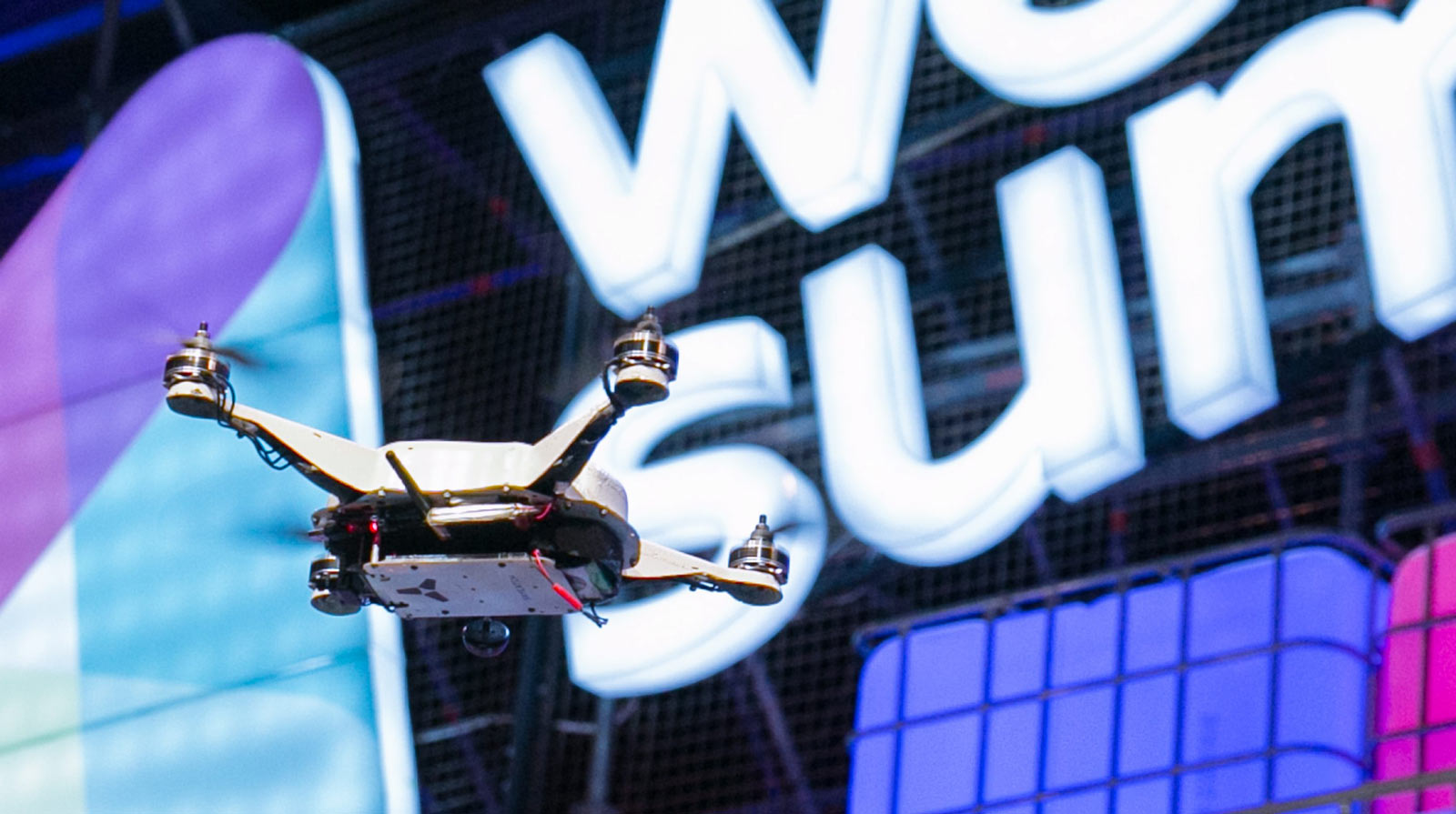 A SkyCatch-built drone flies over the stage at Web Summit in Dublin, Ireland.