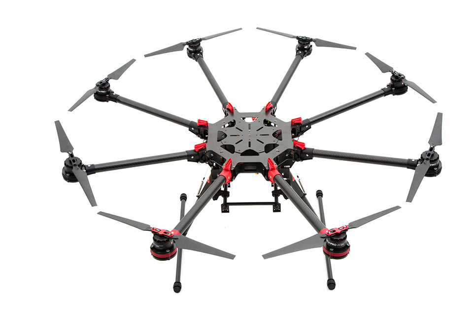 The DJI S1000+ octocopter drone can carry a high-end SLR for photo or video capture. The FAA has granted exemptions to some drone companies, letting them use DJI products in their commercial drone work.