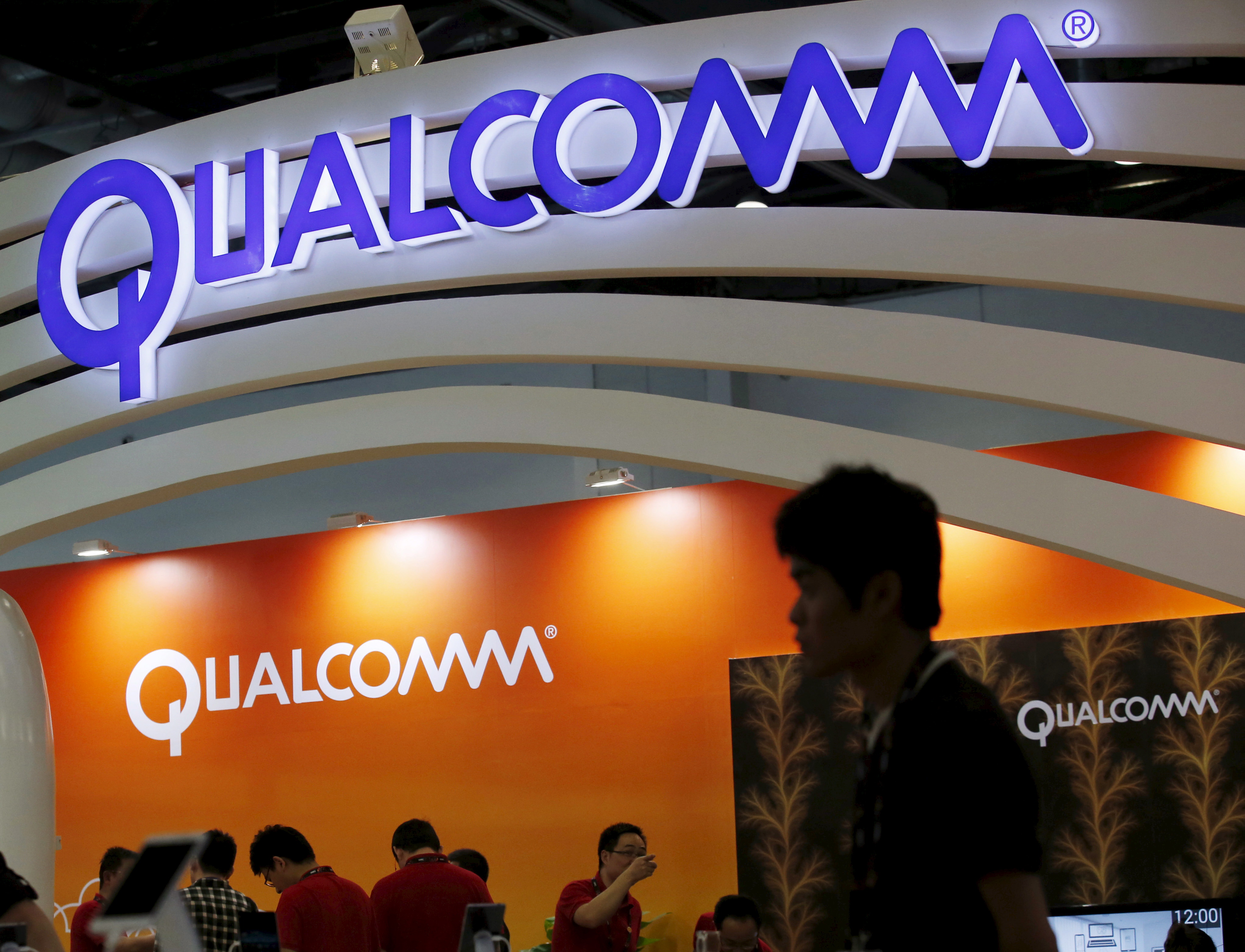 Qualcomm's logo is seen at its booth at the Global Mobile Internet Conference