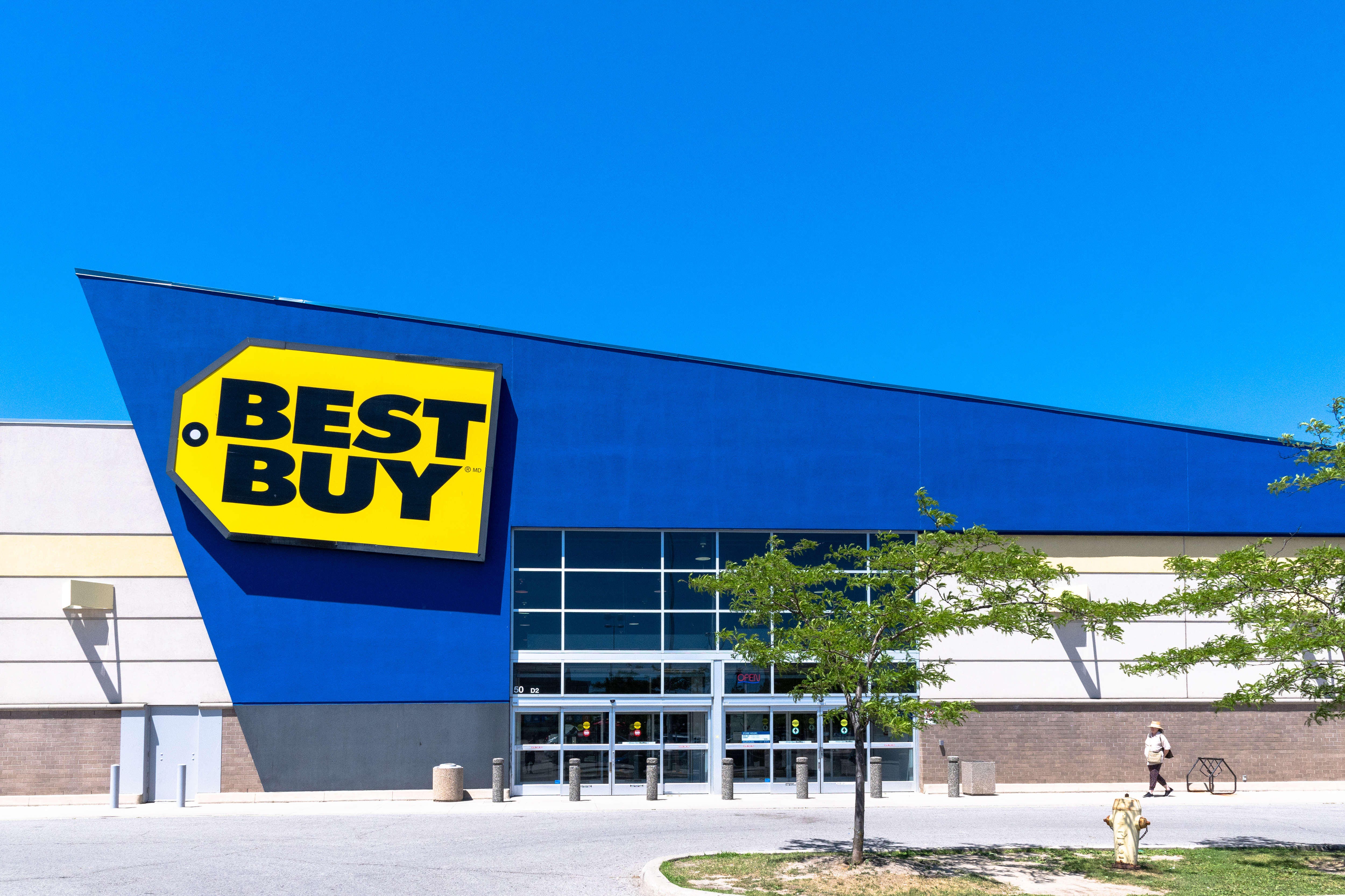 Entrance of a Best Buy store during a day with blue clear