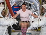 <p>NASA astronaut Meghan McArthur shows off some ISS fashion in June 2021.</p>