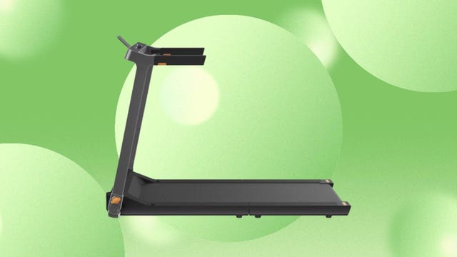 The Kingsmith Walking Pad Double Fold G1SE Treadmill is displayed against a green background.