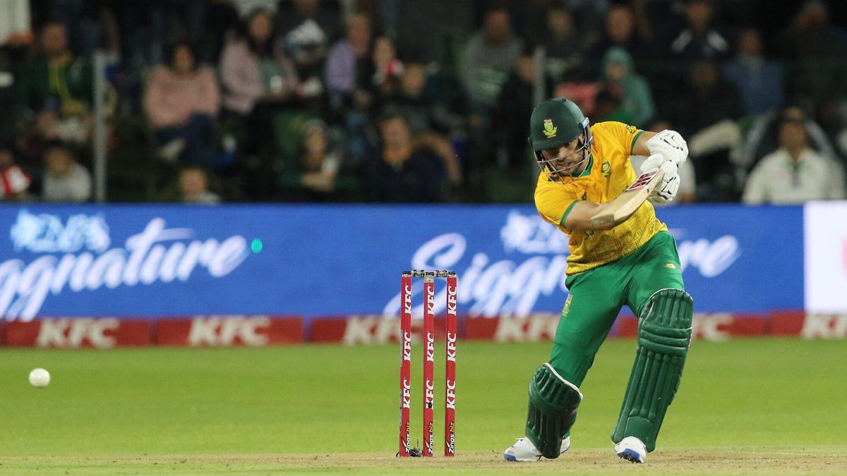 Landscape image of South Africa cricketer Reeza Hendricks hitting a ball, standing in front of a wicket.