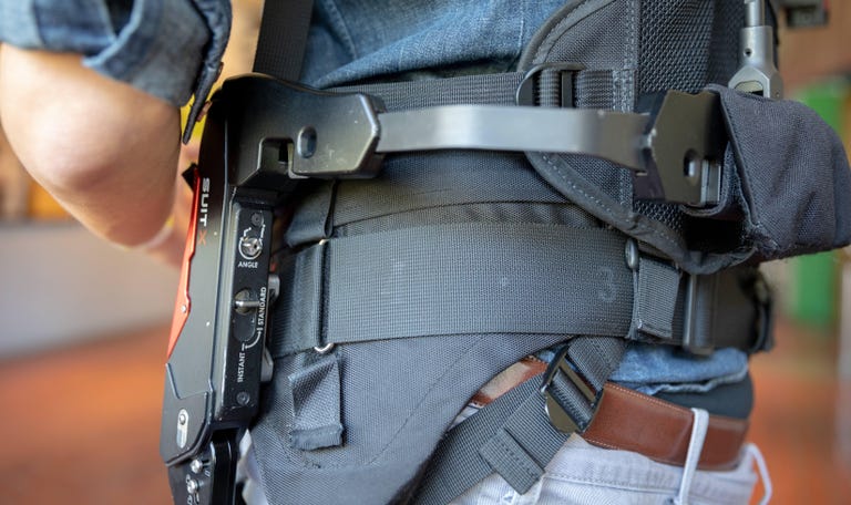 SuitX's LegX and BackX modules strap on at the waist. You can wear one module or combine them.
