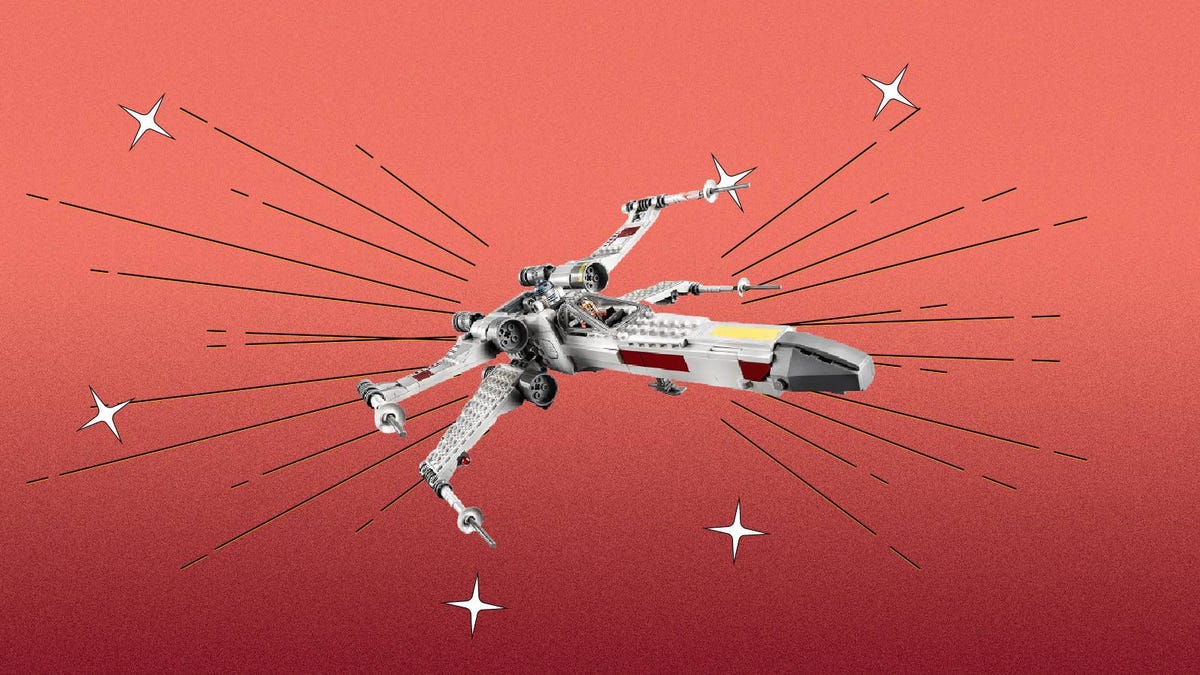 A Lego X-Wing fighter against a red background.