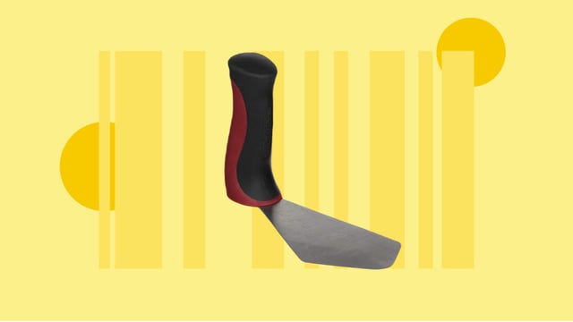 A spatula with a red and black handle with a yellow barcode
