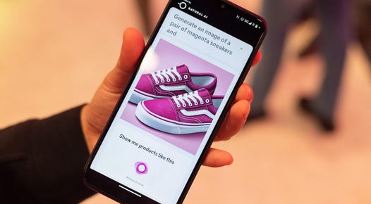 Phone screen showing pink sneakers