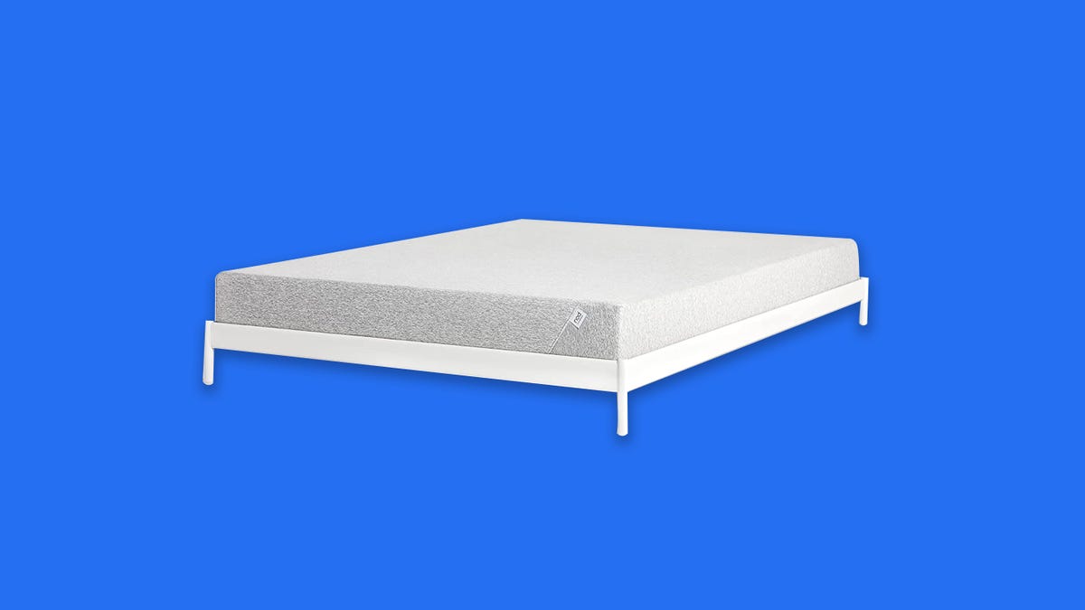 The Tuft and Needle Nod mattress on a plain blue background