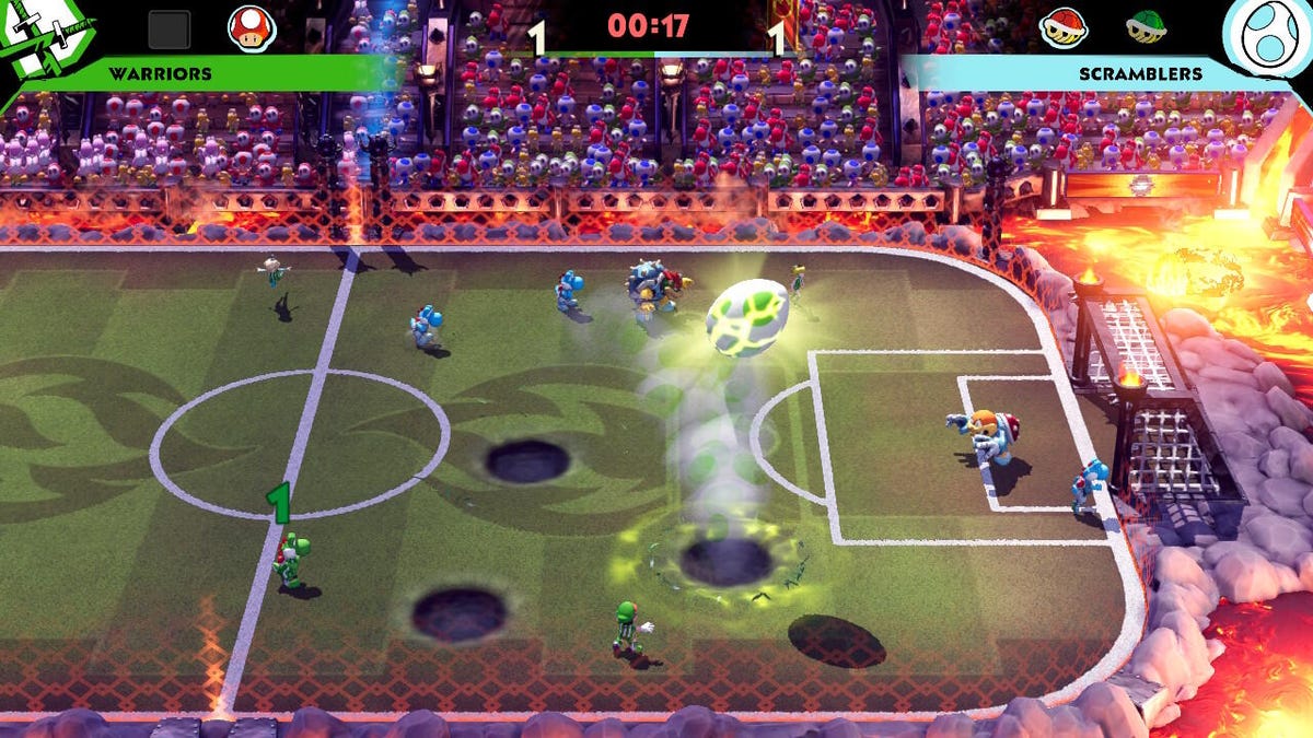Yoshi launches a giant egg at the soccer field's goal.