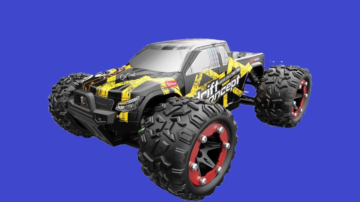A black and yellow RC truck against a purple background.