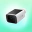 A Eufy solar-powered security camera against a green background.