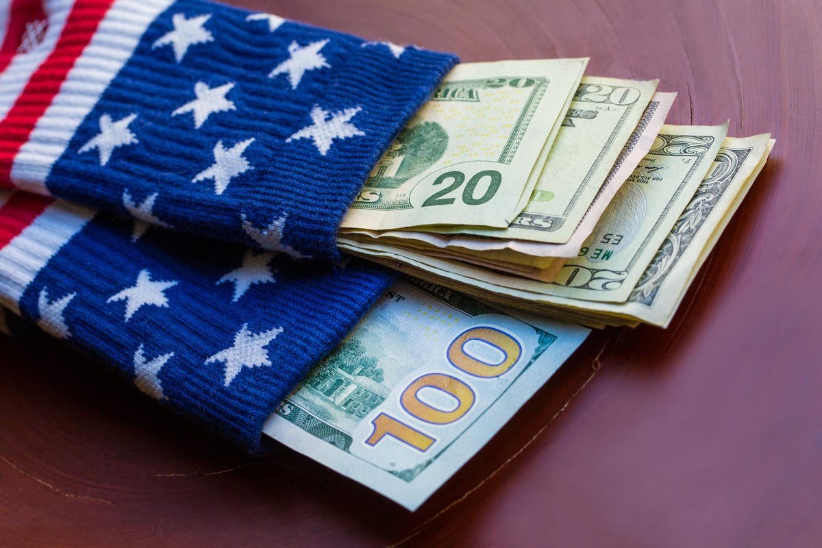money-dollars-bills-sock-american-flag
