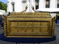 <p>This Ark of the Covenant movie prop was made with hot glue, picture frames, trophies and spray paint.</p>