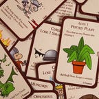 Munchkin cards scattered across the image