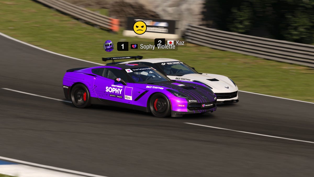 An AI-driven race car, Sophy Violette, passes a human-driven competitor in Sony's Gran Turismo 7 videogame.