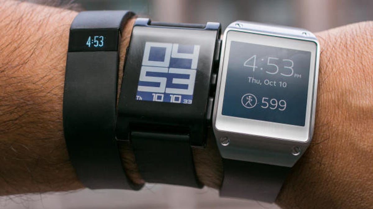 Google may join Fitbit Force, Pebble, and Samsung Galaxy Gear (l-r) in trying to earn a spot on your wrist.