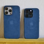 A photo of the iPhone 15 Pro and Pro Max with FineWoven cases
