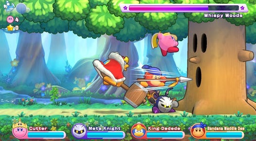 Four players battling a tree in the video game Kirby Return to Dreamland Deluxe