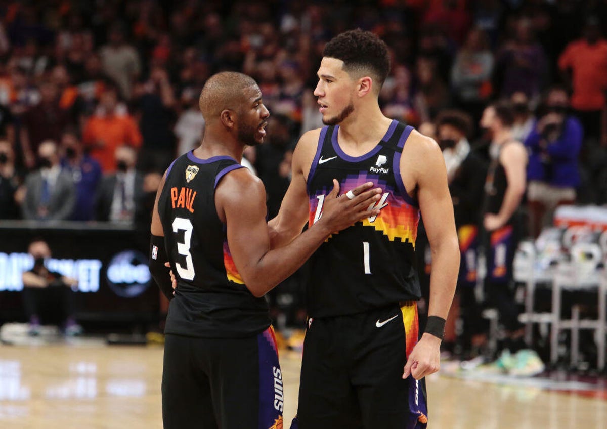 Chris Paul and Devin Booker during the 2021 NBA playoffs
