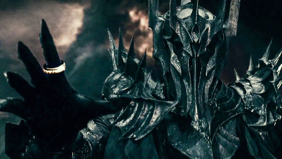 Sauron in armor with the One Ring on his dark fingers