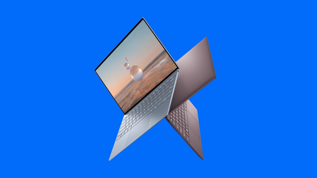 Dell XPS 13 9315 laptop in sky and umber colors on a blue background